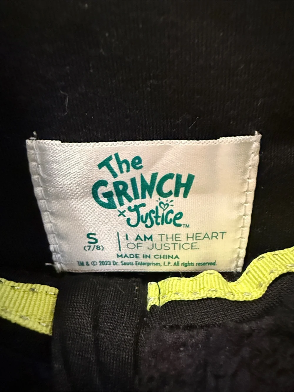 The Grinch Justice Black & White Varsity Style Jacket with Grinch Patch